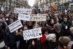Durant la marche républicaine, à Paris le 11 janvier 2015, en hommage aux 17 victimes des attentats de Charlie Hebdo et de l’Hyper Cacher.